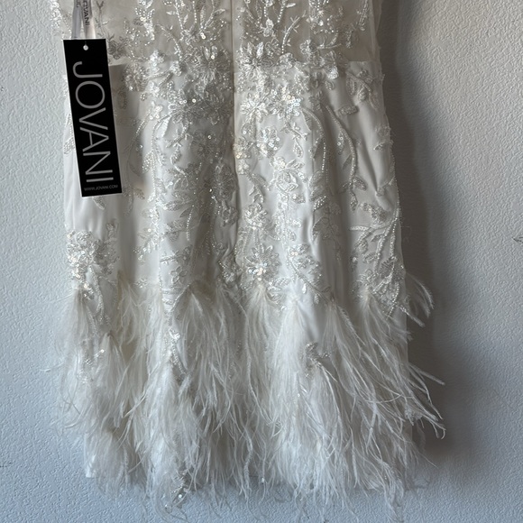 Jovani Scoop neck flower embellished bodice with mesh and a feathered Miniskirt. - Picture 10 of 10